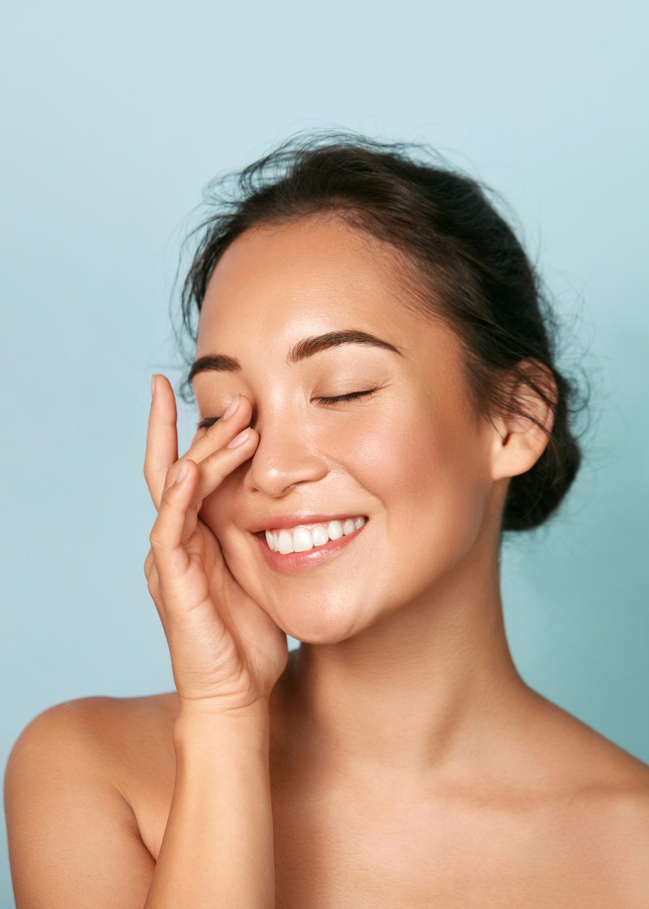 Photo - a woman happy after getting vitamin boosters injected