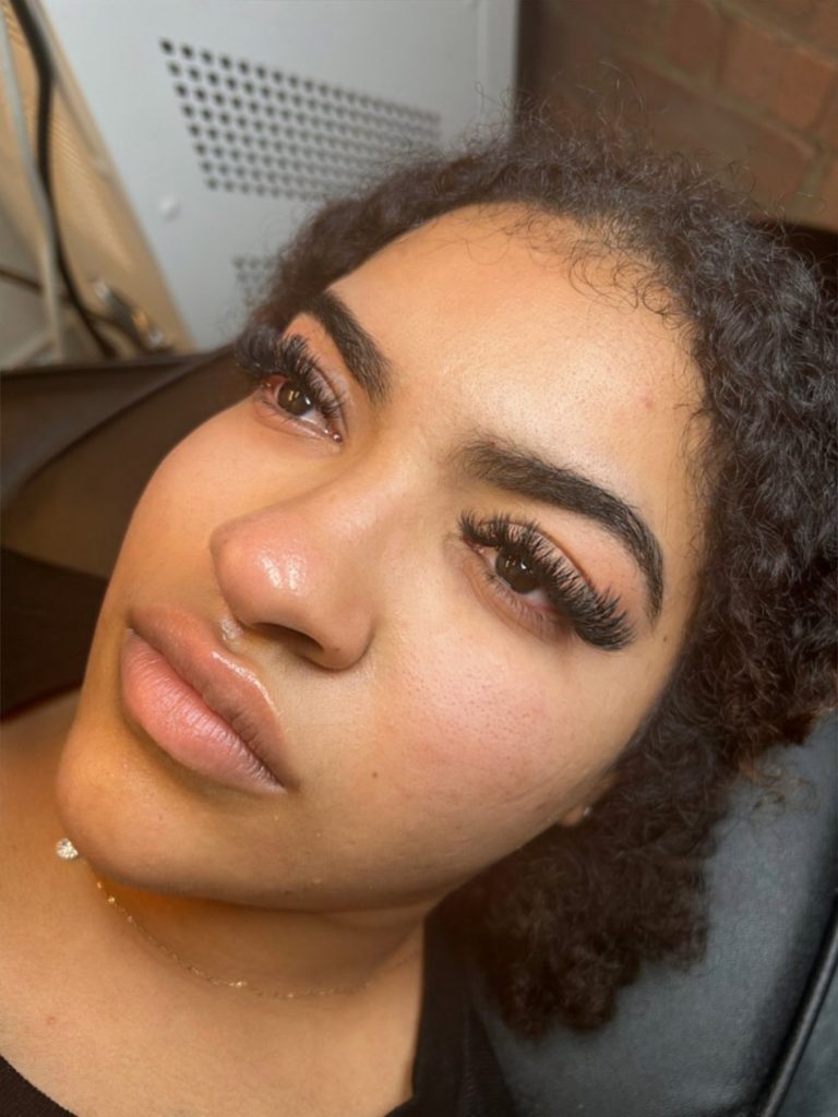 Photo - A woman getting lashes done