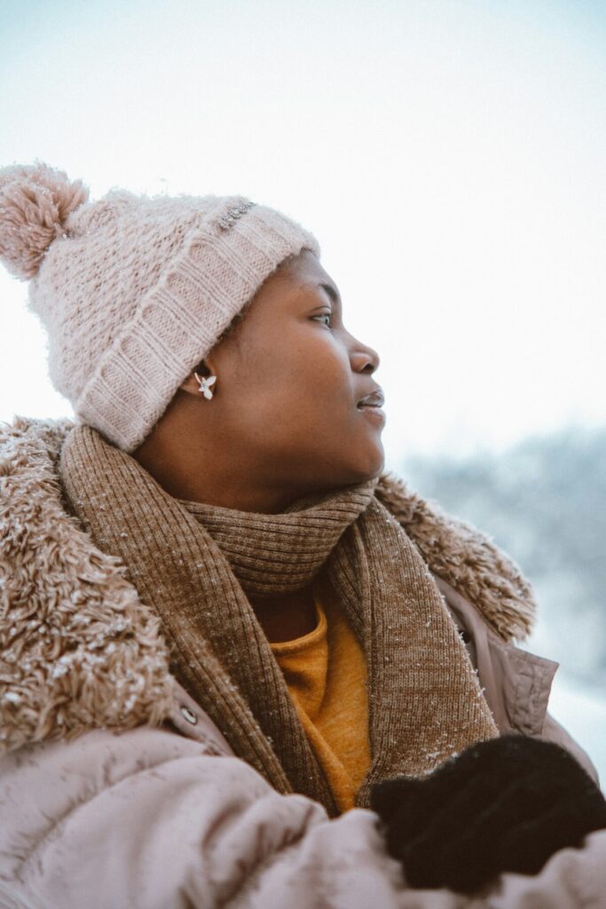 Photo - A woman with glowing skin after getting post-holiday skin damage repair treatements